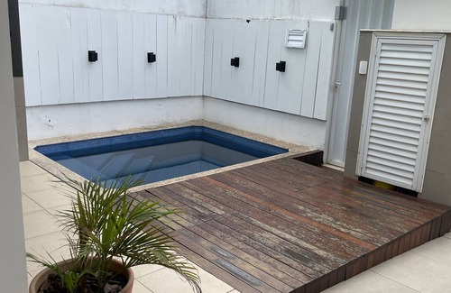 Praia dos Amores House | House with 3 suites, swimming pool, close to the beach.