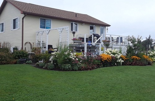 Saint-Joseph-de-Kent House | House with multi-level deck and water views in Bouctouche