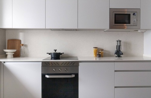 Nueva Espana Apartment | Housing Castellana X X I I I by Sharing Co