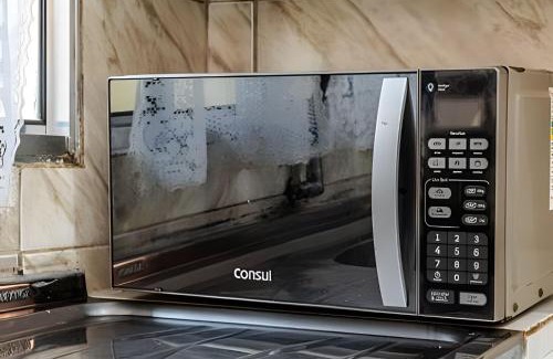 Quietude House | HP5 - Casa em Condomínio, Ar Condicionado, Churrasqueira, Wi Fi 250mb e Estacionamento Grátis