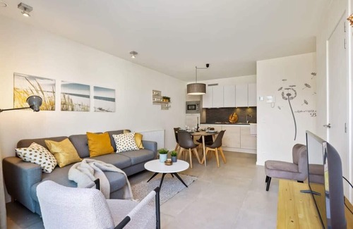 Westende Apartment | Huswell - Apartment with natural swimming pool