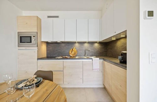 Westende Apartment | Huswell - Apartment with natural swimming pool