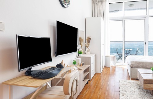Jumeirah Village Triangle Apartment | Hybrid Chic Living: Luxury-Comfort-Productivity in enchanting Dubai