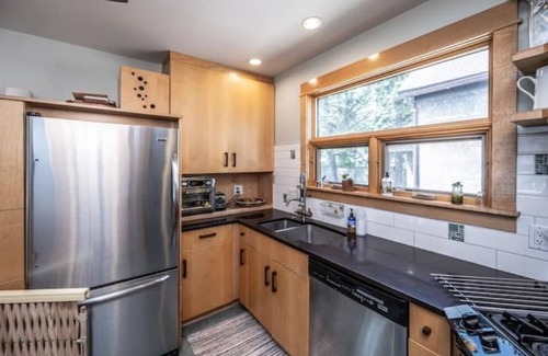 Holland House | Hygge Hideaway with gas fireplace, fenced yard, and eco friendly products