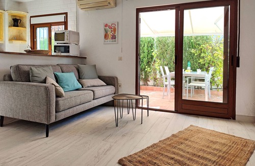 Molinell Ski Chalet | Ibiza-style vacation home with terrace right on the beach. Great pools.