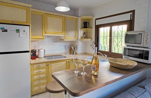 Molinell Ski Chalet | Ibiza-style vacation home with terrace right on the beach. Great pools.