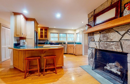 Arlington House | Ideally located spacious home with pool table, large deck, five fireplaces, W/D