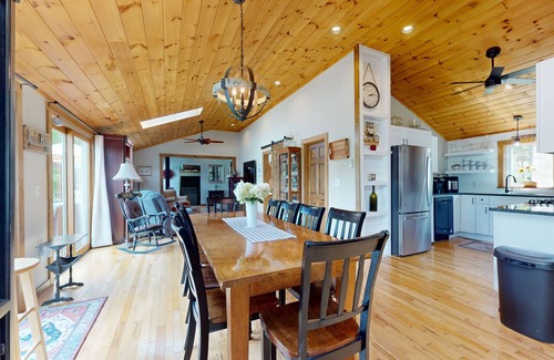 Manchester House | Idyllic & sunny lakefront home with large patio & views - near golf & skiing