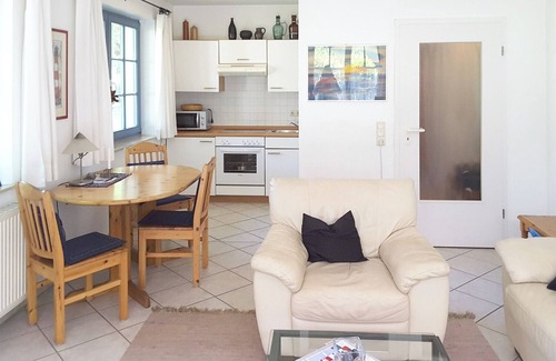 Ostseebad Prerow Apartment | Idyllically situated first floor apartment near Darßer Wald, south-facing terrace, WLAN