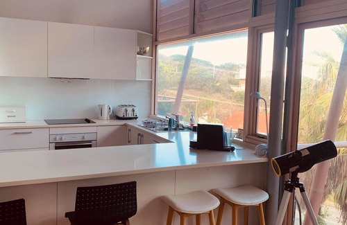 Blueys Beach House | Immaculate designer house-sweeping views over iconic Blueys Beach 3min walk away