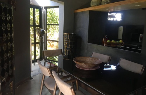 Nianing Villa | In an idyllic setting, refined interior, ethnic chic and industrial style
