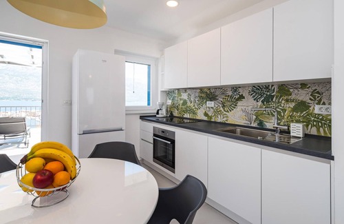 Vinjerac Apartment | In the tranquil coastal village of Vinjerac, this comfortable vacation apartment with a view of the