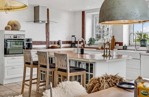 Stege House | In this vacation home you can look forward to a wonderful view of the sea and the countryside.