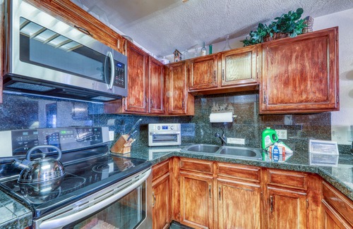 Historic District Condo | In-town condo with ideal walk-to-lifts location, pool, hot tubs & sauna