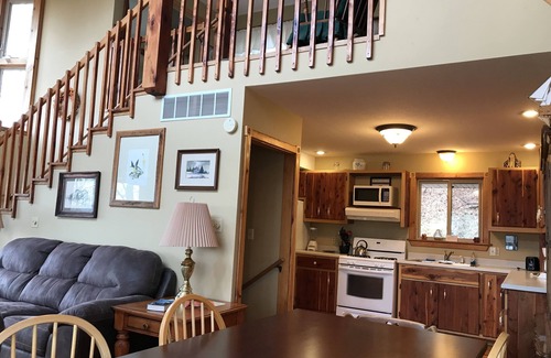 Magnet Cabin | INCREDIBLE river scenes from the plush and comfortable Loft Bedroom