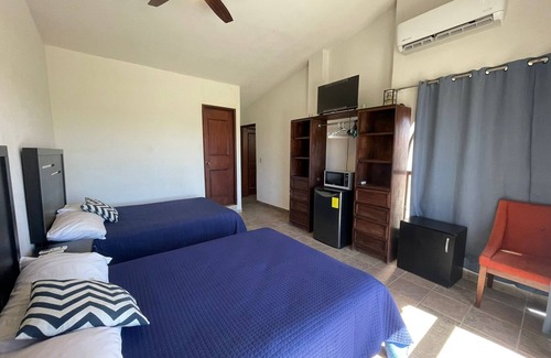 Campo de Golf Fonatur Hotel | Incredible rooms at incredible prices in hotel zone. meters away from the beach!
