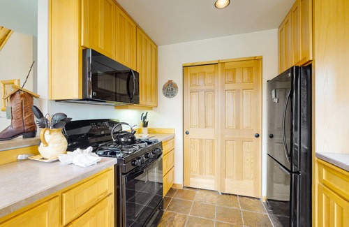 Redmond Ski Chalet | Inviting chalet with private hot tub, grill, 3 pools, hot tub, gym, & tennis