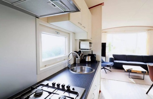 Hollum Ski Chalet | Inviting Dune Chalet in Hollum between Golf course and Beach