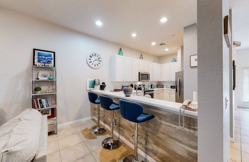 Bahama Bay Condo | Inviting ground-floor condo with homey ambience, water view, & resort amenities