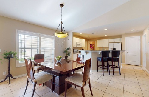 Jacarandas House | Inviting home with screened patio, central AC, full kitchen, & W/D