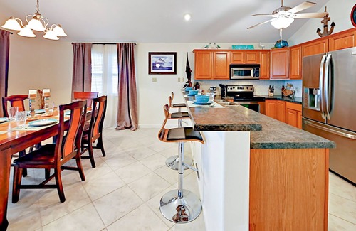 Leeward Sands House | Inviting House w/ Balcony & Large Fenced Backyard - Views of Wetlands