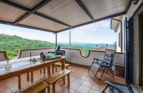 Gassano Apartment | Inviting vacation apartment with panoramic views of the countryside.