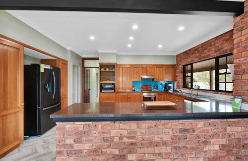 Lovedale House | Ironstone Homestead family private pool and hot spa open fire games room