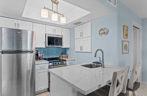 Cedar Key Condo | Island Place 102 Perfect Downtown Getaway with Pool!