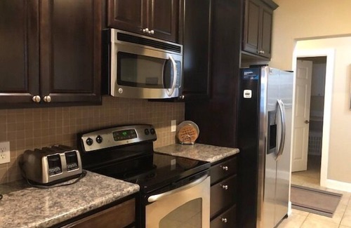 Ludington Condo | It's a Pool View Paradise!