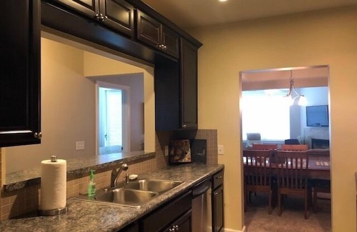 Ludington Condo | It's a Pool View Paradise!