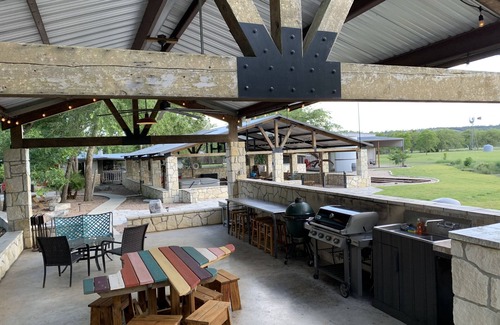 Kerrville House | It’s camp with all the frills! Private waterfront, Pool, Spa, Firepit, Sleeps 31