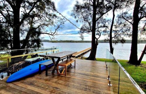 Erowal Bay House | Jerrinja - Absolute waterfront with jetty - 5 mins to Hyams Beach