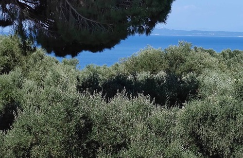 Akrotiri Villa | Jootiq Villas. Combine traditional stone built concept with supreme comfort!