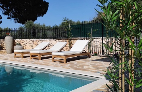 Akrotiri Villa | Jootiq Villas. Combine traditional stone built concept with supreme comfort!