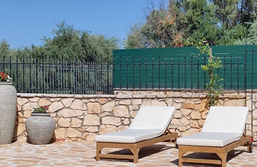 Akrotiri Villa | Jootiq Villas. Combine traditional stone built concept with supreme comfort!