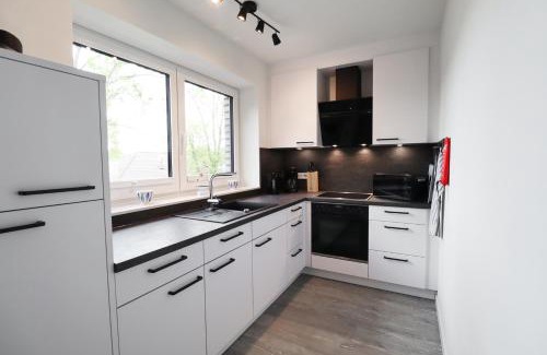 Tossens Apartment | KÜSTE33/38 - strandnah mit Sauna & Balkon direkt an der Küste!