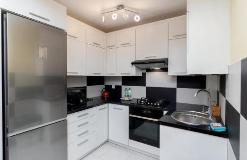 Krakow Apartment | Kalinowe Green Apartment by BookingHost