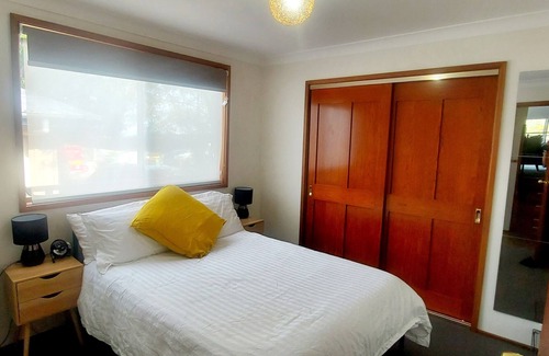 Horsfield Bay House | Kick back and relax in a treehouse with Bay views