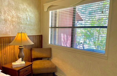 Mount Ida Apartment | King Studio with king bed, dining area, sleeper sofa and view of Lake Ouachita by RedAwning