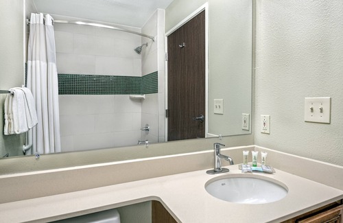 Tech Terrace Condo | King Suite. Shared Pool & Hot Tub. Free Breakfast. Near Texas Tech University & University Medical Center.