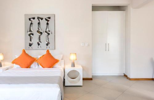 Pointe aux Canonniers Apartment | Kisana Residence - Spacious studio with balcony, shared pool and garden