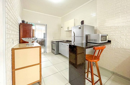 Cibratel II Apartment | Kitnet com WiFi, piscina e churrasq em Itanhaém/SP