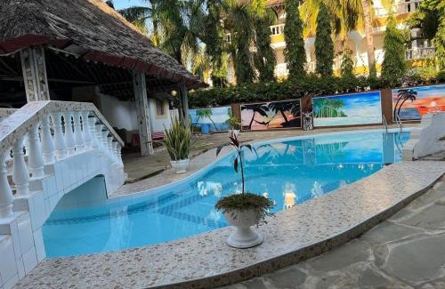 Galu House | Kivuli villas Diani ,located 2 minutes walk to the White sandy Diani Beach
