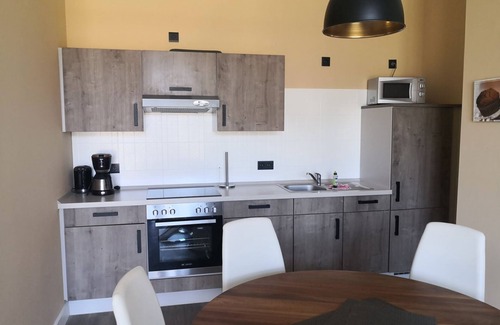 Stolpe Apartment | Kolibri RE-05 - Cozy vacation apartment The Remise Kolibri RE-05 in a rural setting.