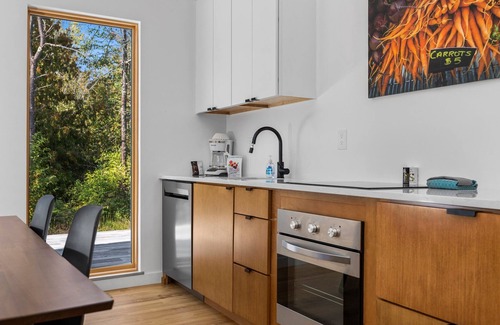Acme Cabin | KOTI 11 (Two Bedroom) Traverse City's Scandinavian Cabins, vacation home on TART & mins to Traverse