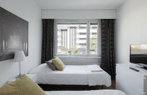 Ylamylly Apartment | Kotimaailma Apartments Joensuu