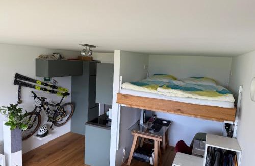 Strobl Apartment | Kuscheln im Hochbett mit Seeblick