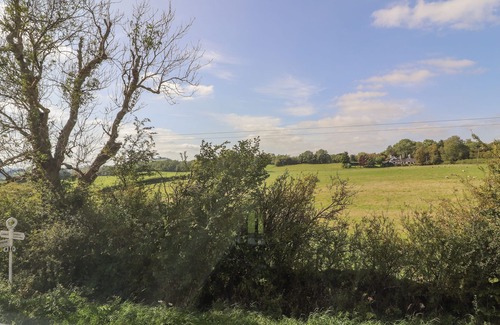 Longford Cottage | KWENRITH'S COTTAGE, pet friendly, with a garden in Oswestry