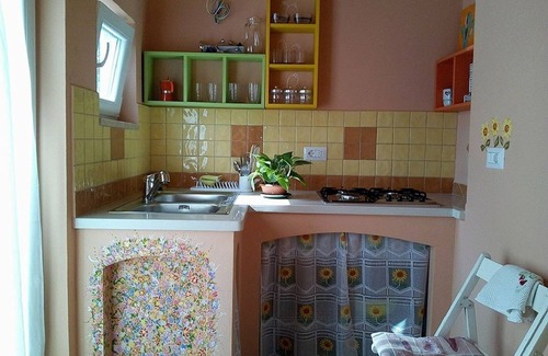 Condro Apartment | L 'Ulivo: dépendance with sea view with large terrace and fragrant garden.