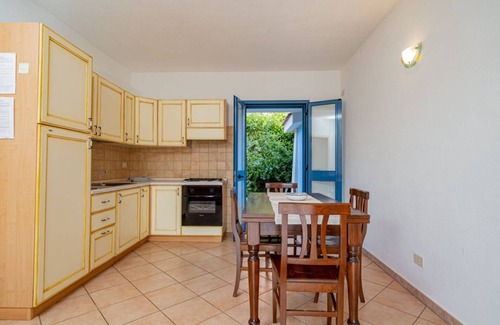Monte Petrosu Apartment | La Tartaruga three-room apartment sleeps 4 in facility with swimming pool